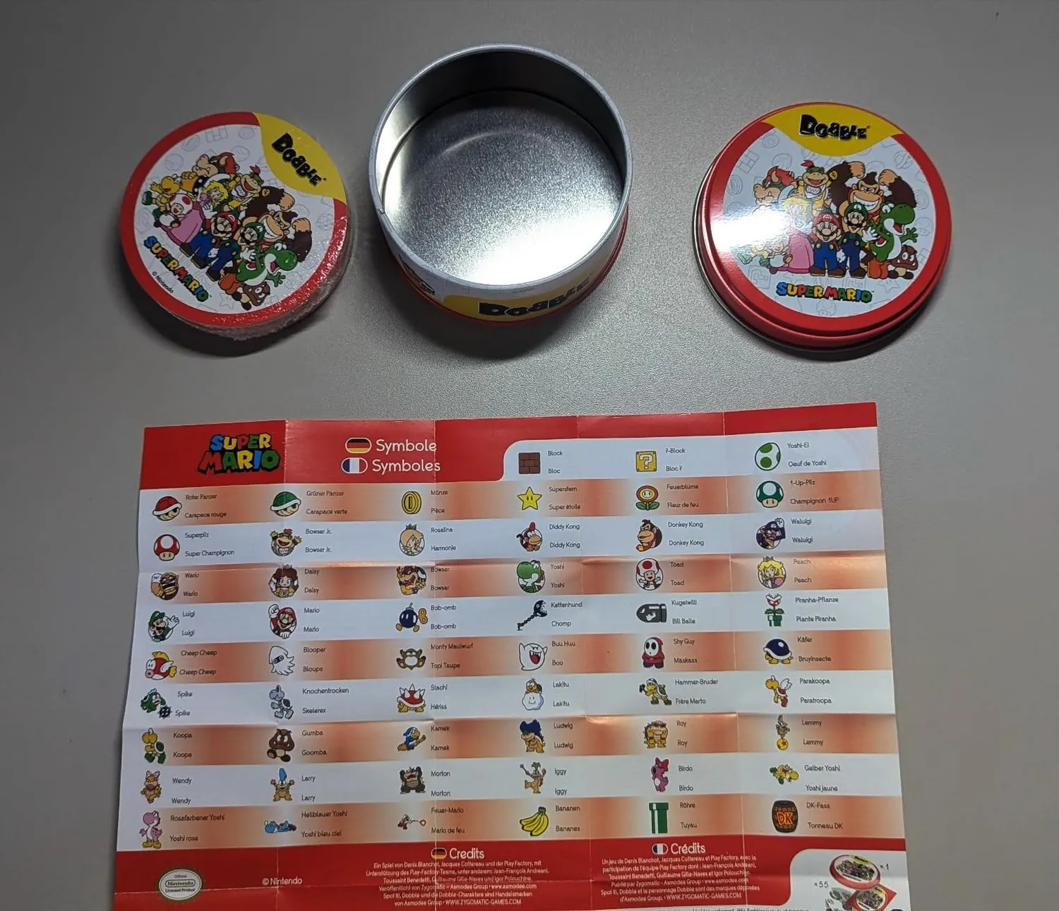 Asmodee Dobble Super Mario Kartenspiel Blechdose