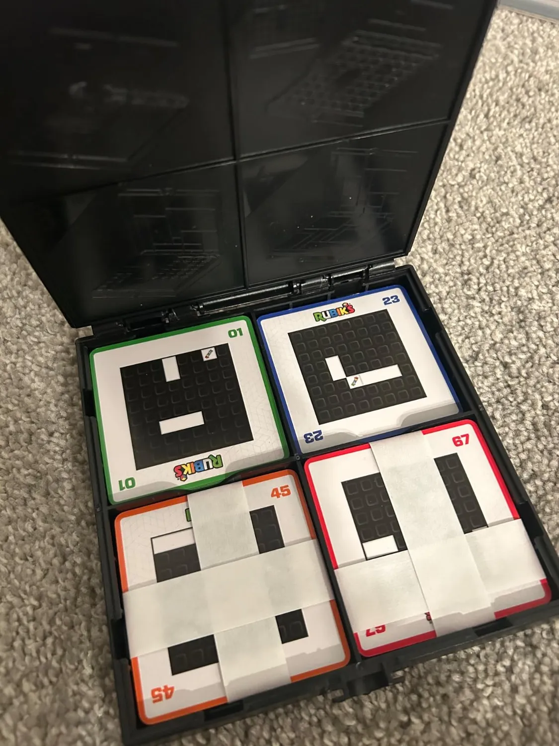 Rubik's Gridlock Knobelspiel mit 88 Aufgaben solo und Team